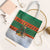 Giraffes Decorating Tree Gifts Tote Bag with Orange Green Holiday Pattern Design - Wonder Print Shop