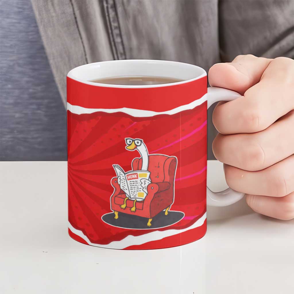 Silly Goose Ceramic Mug with Newspaper and Armchair Pattern