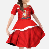 Silly Goose Kid Short Sleeve Dress with Newspaper and Armchair Pattern