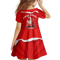 Silly Goose Kid Short Sleeve Dress with Newspaper and Armchair Pattern