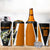 Bass Fishing 4 in 1 Can Cooler Tumbler Jumping Largemouth Fish on Black Hex Pattern and Orange White Lightning Accents - Wonder Print Shop
