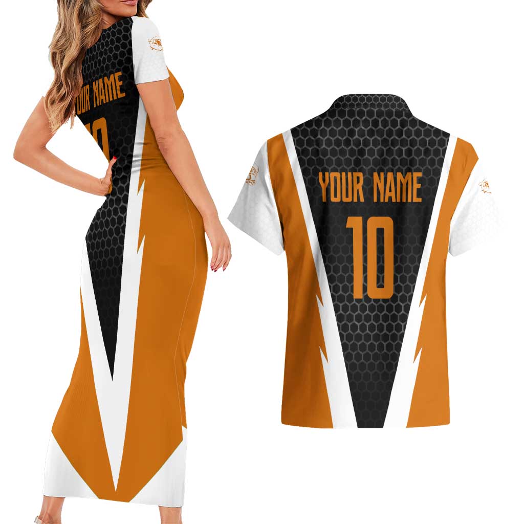 Bass Fishing Couples Matching Short Sleeve Bodycon Dress and Hawaiian Shirt Jumping Largemouth Fish on Black Hex Pattern and Orange White Lightning Accents - Wonder Print Shop