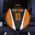 Bass Fishing Spare Tire Cover Jumping Largemouth Fish on Black Hex Pattern and Orange White Lightning Accents - Wonder Print Shop