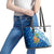 West Indies Christmas Leather Tote Bag with Santa Riding Turtle Palm Tree and Tribal Snowflake Design - Wonder Print Shop