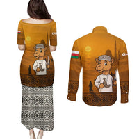 Oman Couples Matching Puletasi and Long Sleeve Button Shirt with Traditional Camel Character and Desert Silhouette Design
