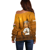 Oman Off Shoulder Sweater with Traditional Camel Character and Desert Silhouette Design
