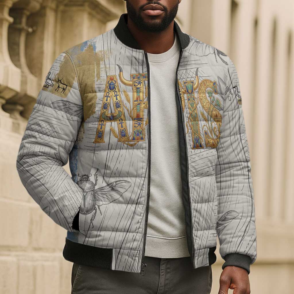 Apis Ancient Egyptian Bomber Puffer Jacket with Beige-Gray Hieroglyphic, Ornate Bull Head, and Gold-Blue Typography - Wonder Print Shop