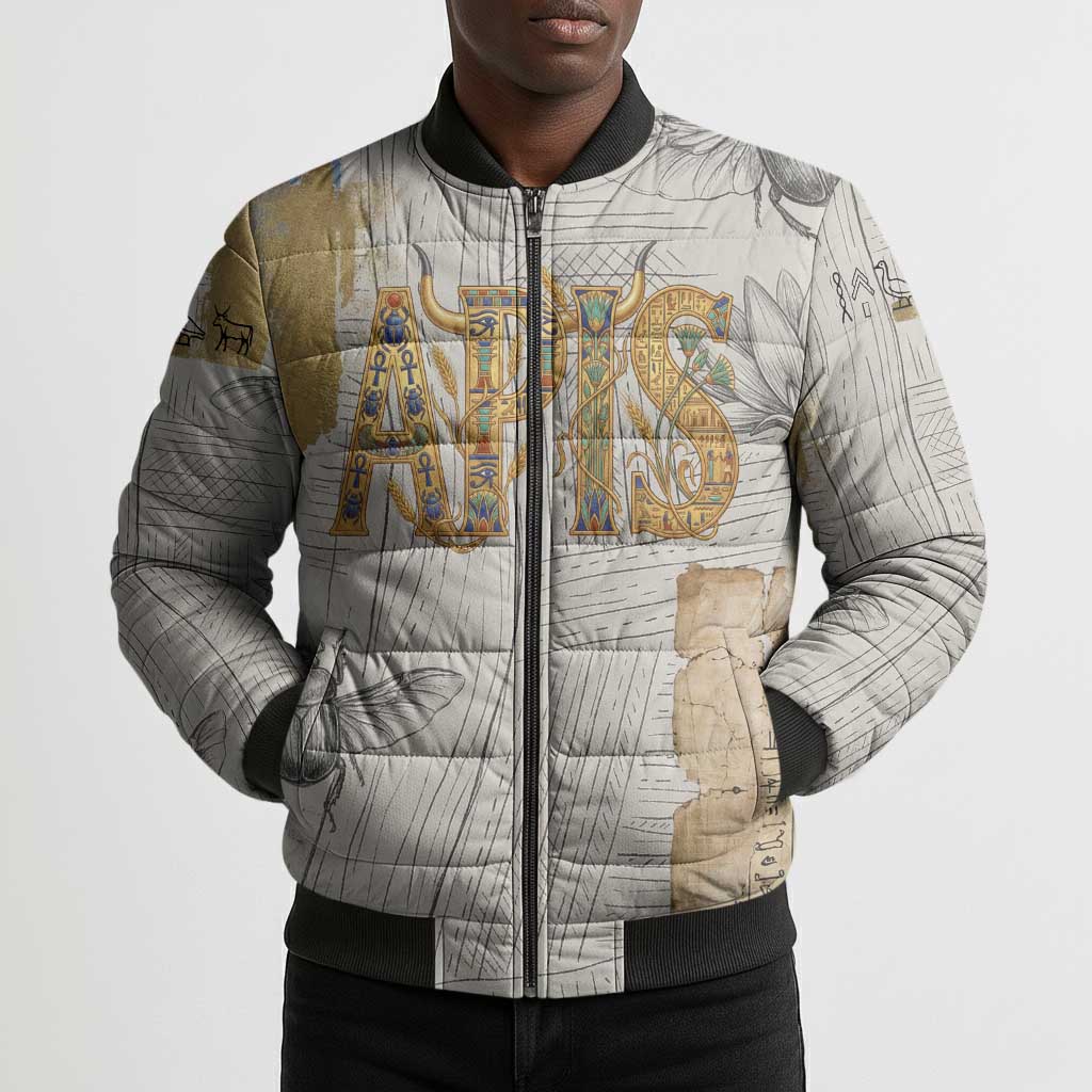 Apis Ancient Egyptian Bomber Puffer Jacket with Beige-Gray Hieroglyphic, Ornate Bull Head, and Gold-Blue Typography - Wonder Print Shop