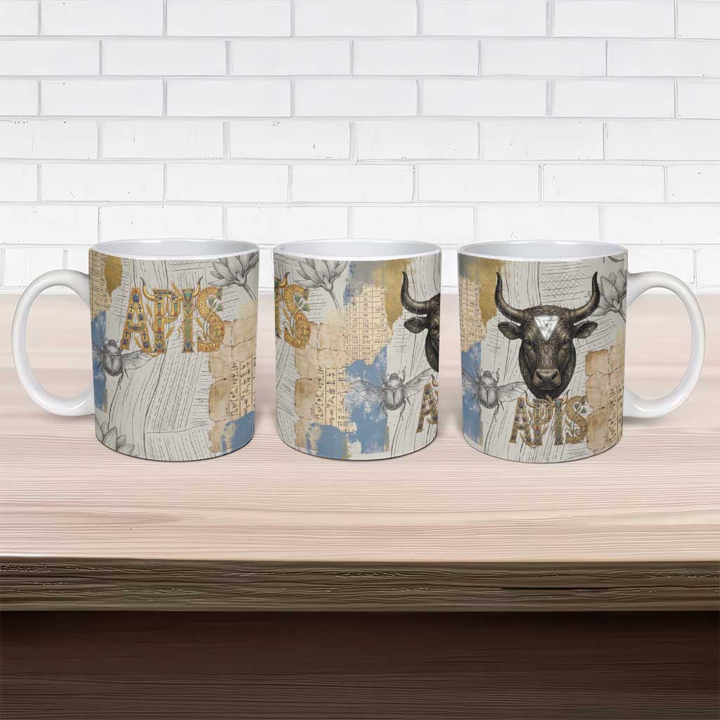 Apis Ancient Egyptian Ceramic Mug with Beige-Gray Hieroglyphic, Ornate Bull Head, and Gold-Blue Typography - Wonder Print Shop