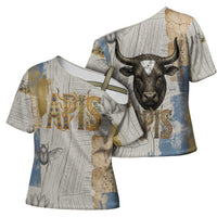 Apis Ancient Egyptian Cross Shoulder Shirt with Beige-Gray Hieroglyphic, Ornate Bull Head, and Gold-Blue Typography - Wonder Print Shop