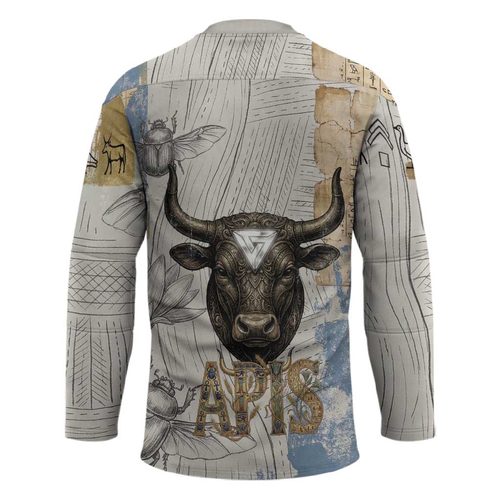 Apis Ancient Egyptian Hockey Jersey with Beige-Gray Hieroglyphic, Ornate Bull Head, and Gold-Blue Typography - Wonder Print Shop