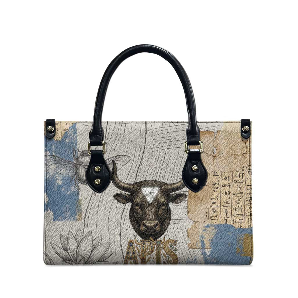 Apis Ancient Egyptian Leather Bag with Beige-Gray Hieroglyphic, Ornate Bull Head, and Gold-Blue Typography - Wonder Print Shop
