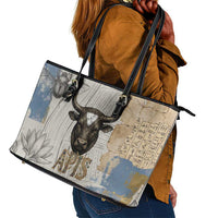 Apis Ancient Egyptian Leather Tote Bag with Beige-Gray Hieroglyphic, Ornate Bull Head, and Gold-Blue Typography - Wonder Print Shop
