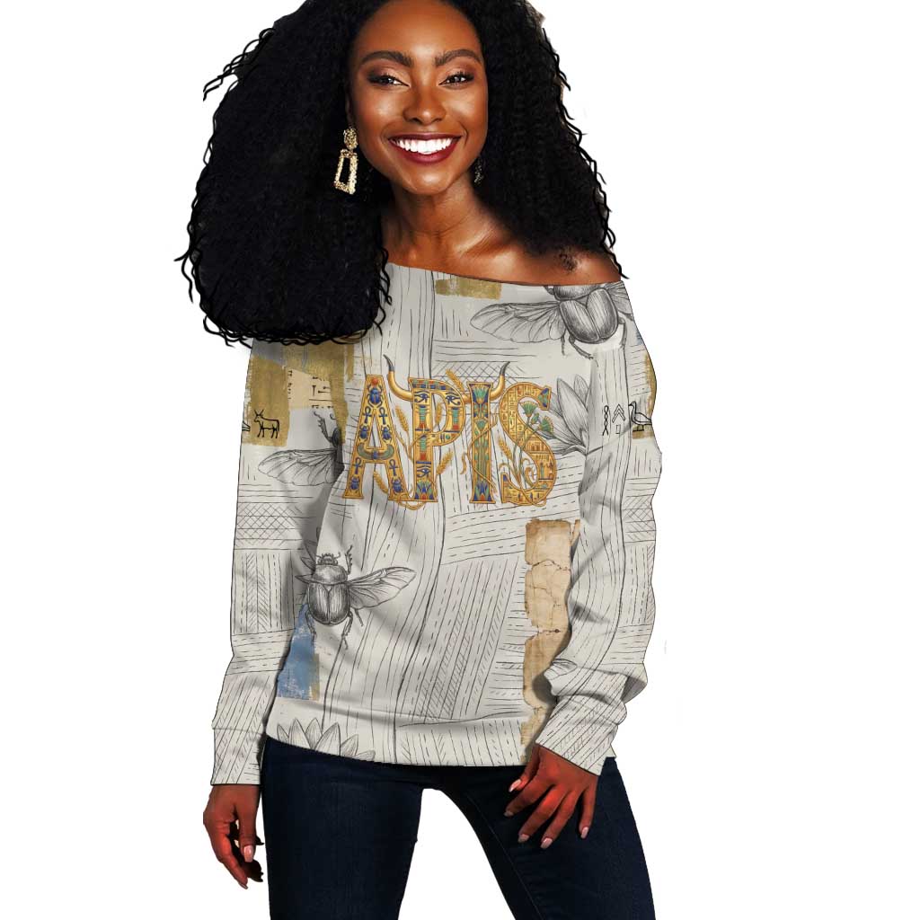 Apis Ancient Egyptian Off Shoulder Sweater with Beige-Gray Hieroglyphic, Ornate Bull Head, and Gold-Blue Typography - Wonder Print Shop