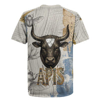 Apis Ancient Egyptian Rugby Jersey with Beige-Gray Hieroglyphic, Ornate Bull Head, and Gold-Blue Typography - Wonder Print Shop