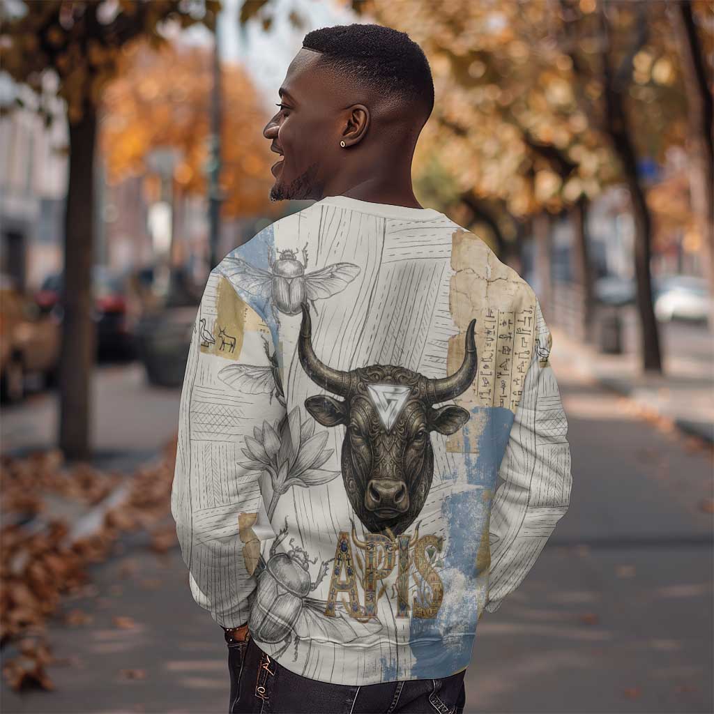 Apis Ancient Egyptian Sweatshirt with Beige-Gray Hieroglyphic, Ornate Bull Head, and Gold-Blue Typography - Wonder Print Shop