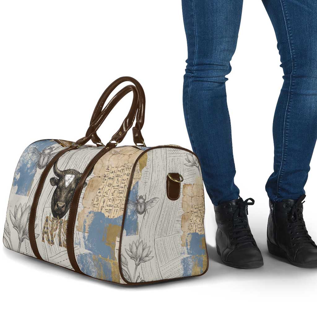 Apis Ancient Egyptian Travel Bag with Beige-Gray Hieroglyphic, Ornate Bull Head, and Gold-Blue Typography - Wonder Print Shop