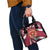 Latvia Shoulder Handbag with Freedom Monument and Doves Graphic – 18 November 1918 Design