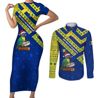 Saint Vincent and the Grenadines Christmas Couples Matching Short Sleeve Bodycon Dress and Long Sleeve Button Shirt with Parrot Playing Steelpan and Tropical Pattern Design - Wonder Print Shop