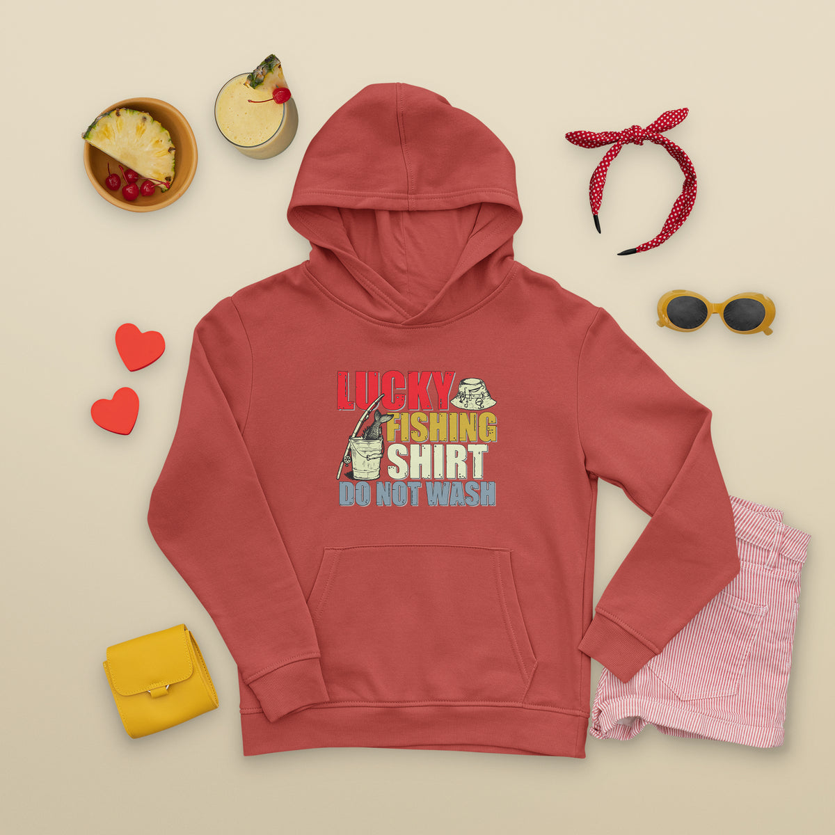 Red fishing hoodie with "Lucky Fishing Shirt Do Not Wash" front graphic and kangaroo pocket.