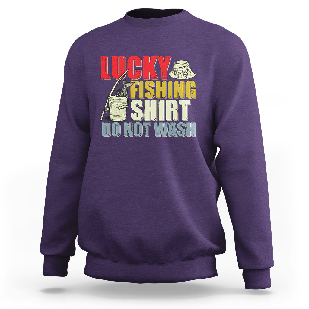 Purple fishing sweatshirt with Lucky Fishing Shirt 'Do Not Wash' graphic.