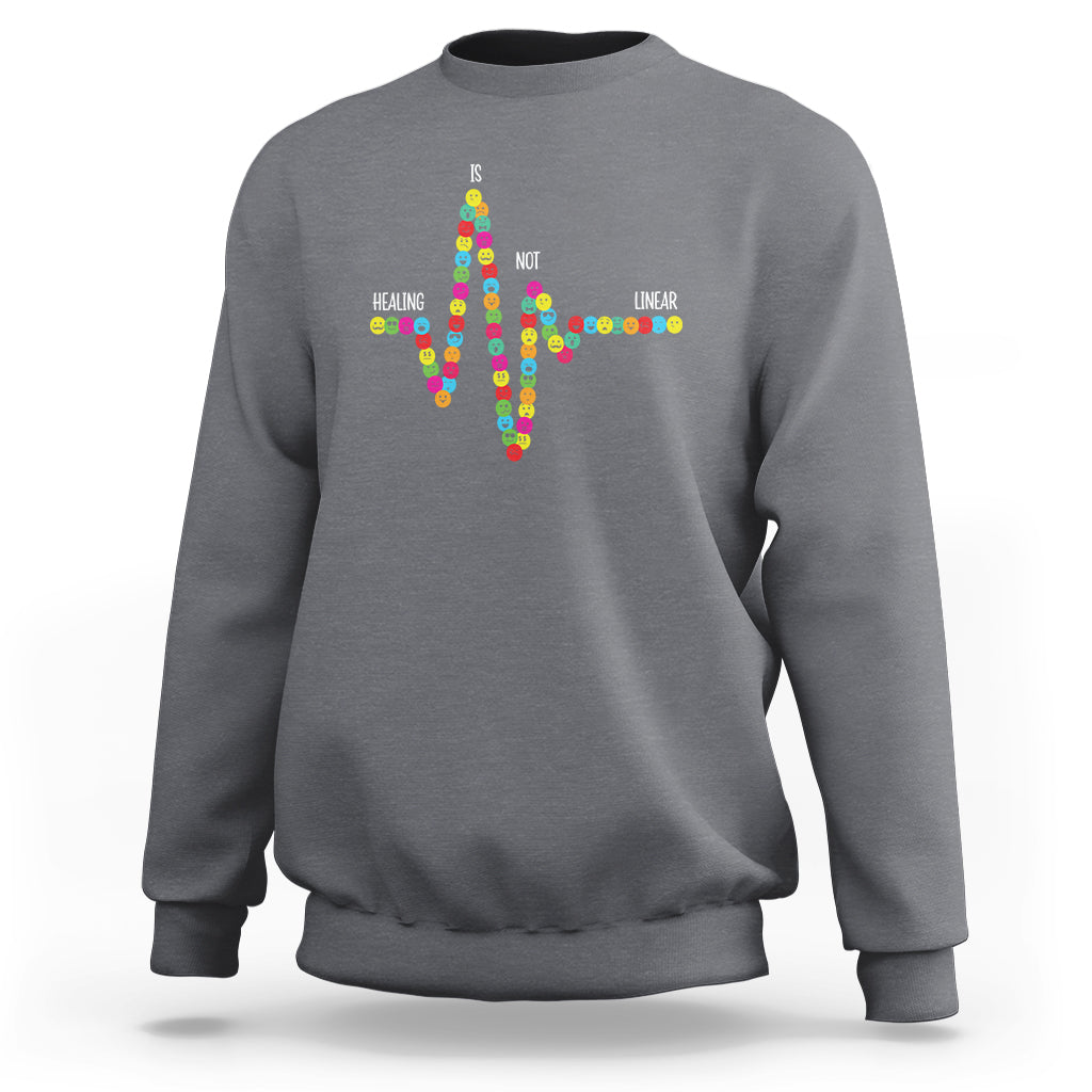 Mental Health Sweatshirt Healing Is Not Linear Emotion Faces - Wonder Print Shop