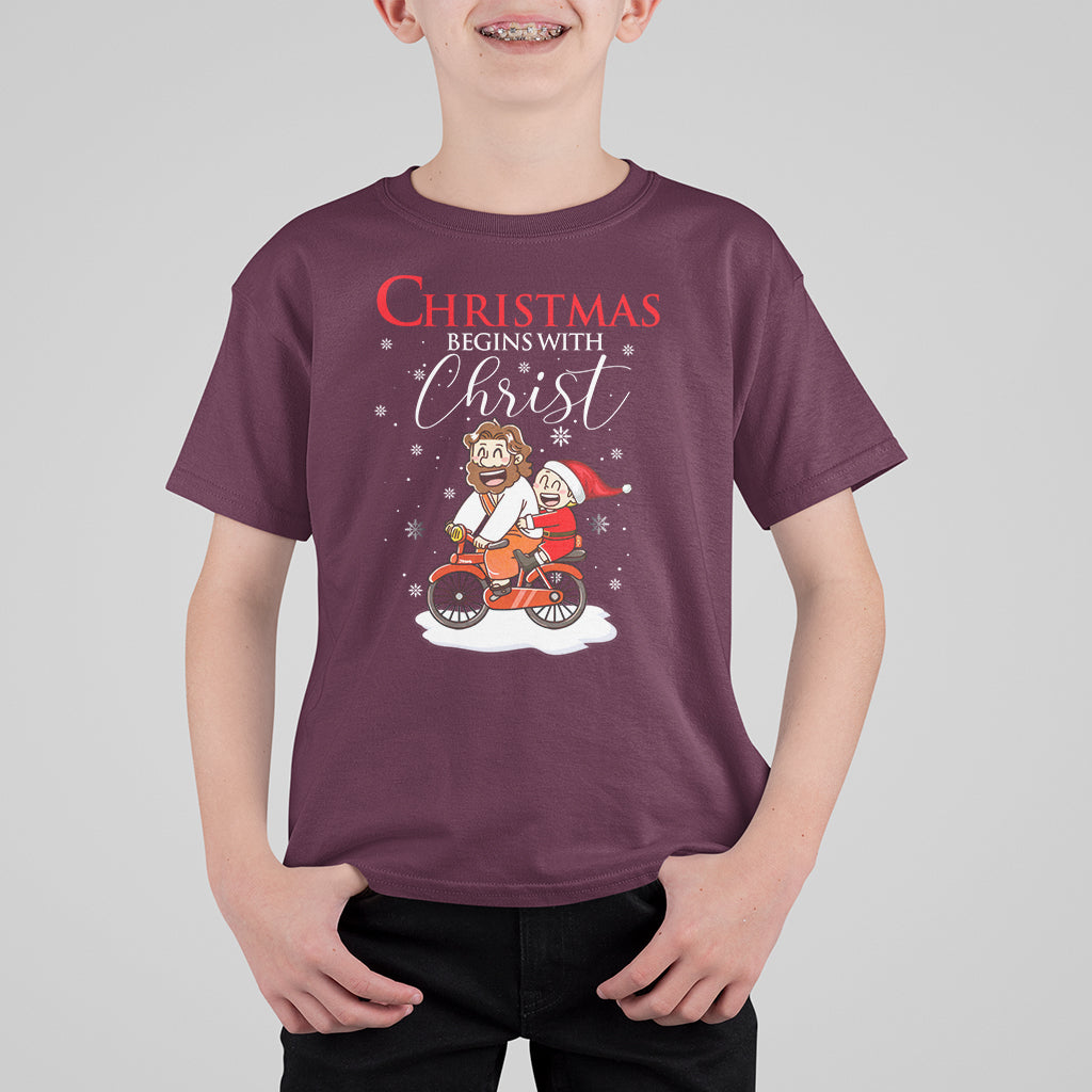 Christmas Begins With Christ Jesus Santa Riding Bicycle T Shirt For Kid - Wonder Print Shop