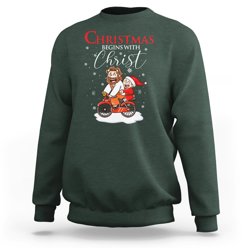 Christmas Begins With Christ Jesus Santa Riding Bicycle Sweatshirt - Wonder Print Shop