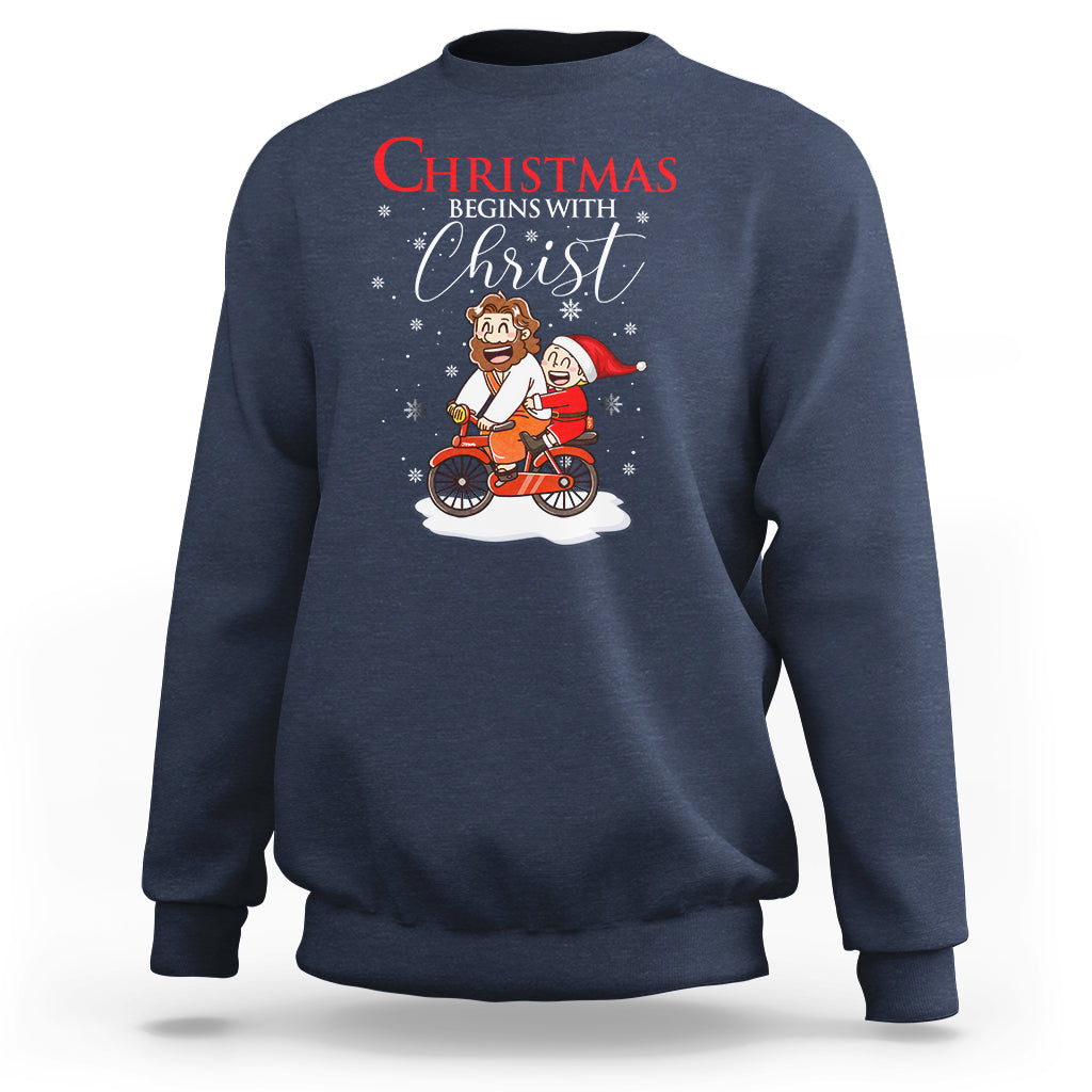 Christmas Begins With Christ Jesus Santa Riding Bicycle Sweatshirt - Wonder Print Shop