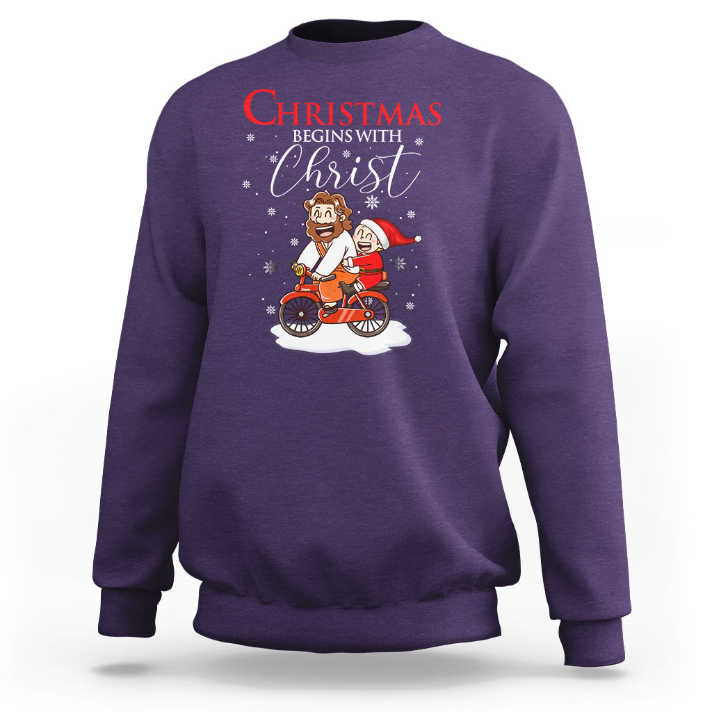 Christmas Begins With Christ Jesus Santa Riding Bicycle Sweatshirt - Wonder Print Shop
