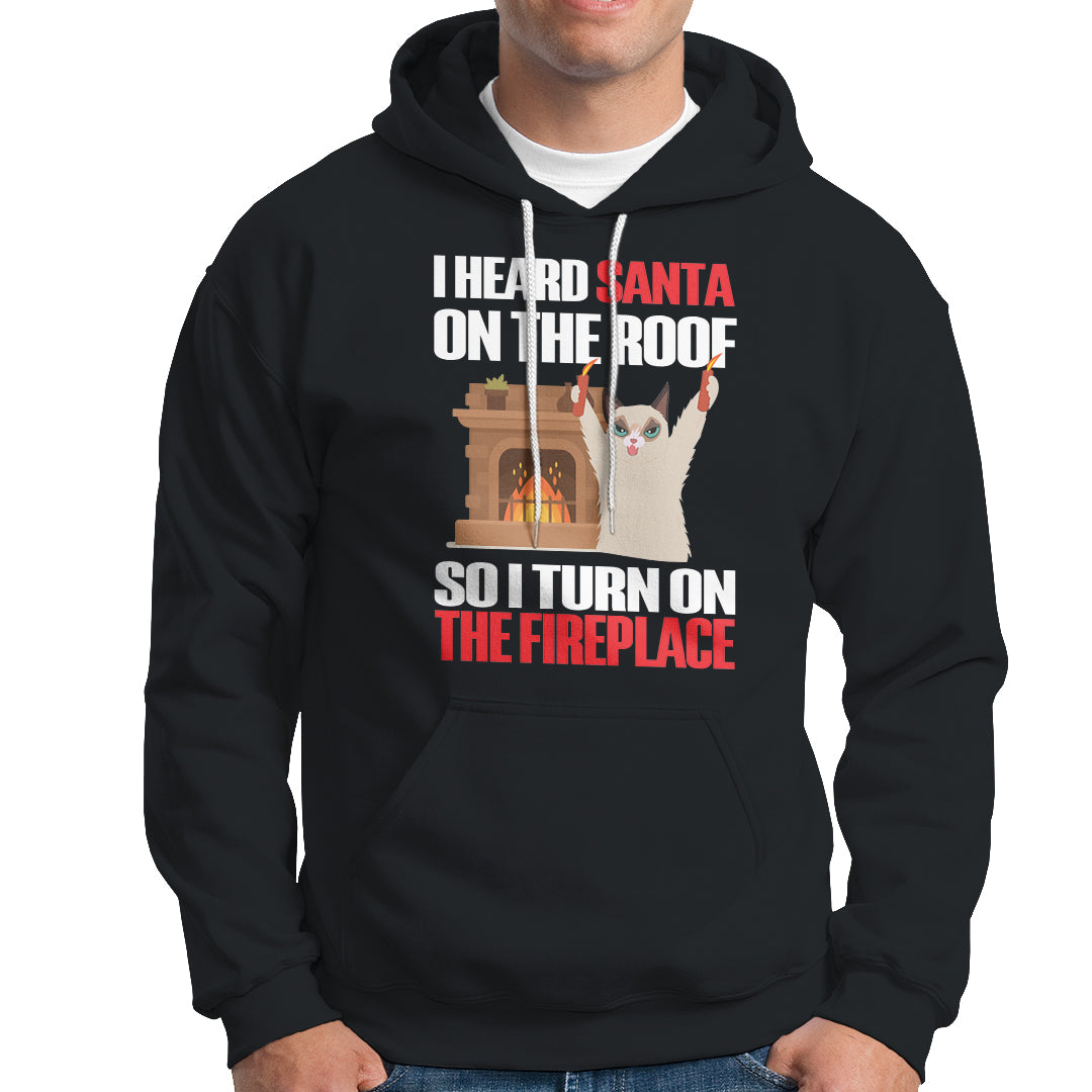 Cat Hates Santa Turned On The Fireplace Funny Christmas Hoodie - Wonder Print Shop