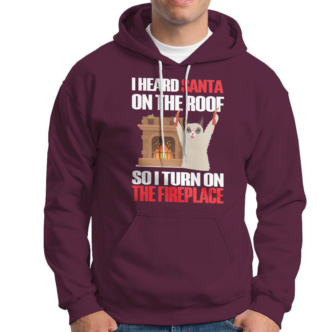 Cat Hates Santa Turned On The Fireplace Funny Christmas Hoodie - Wonder Print Shop