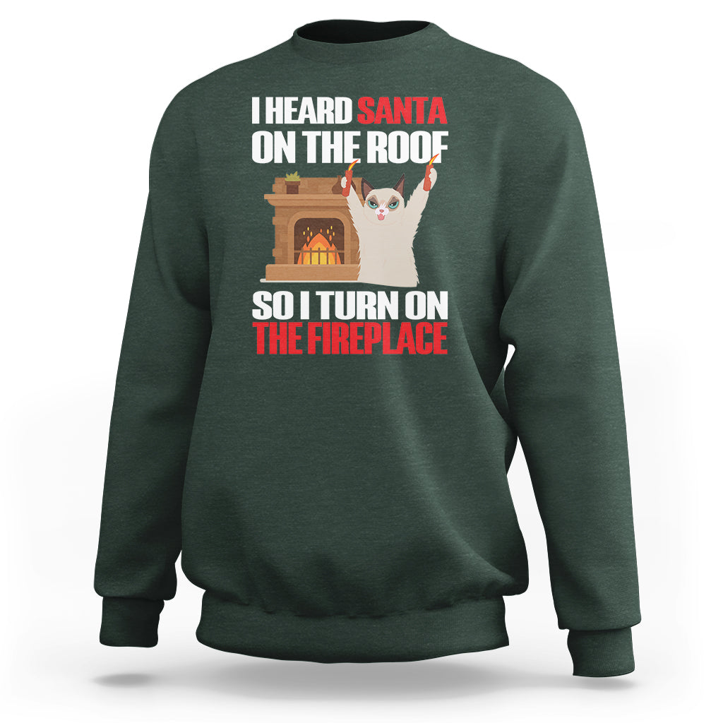 Cat Hates Santa Turned On The Fireplace Funny Christmas Sweatshirt - Wonder Print Shop