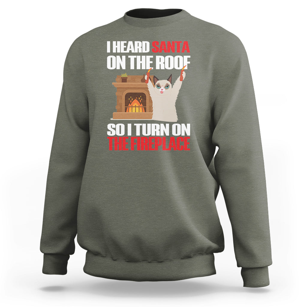 Cat Hates Santa Turned On The Fireplace Funny Christmas Sweatshirt - Wonder Print Shop