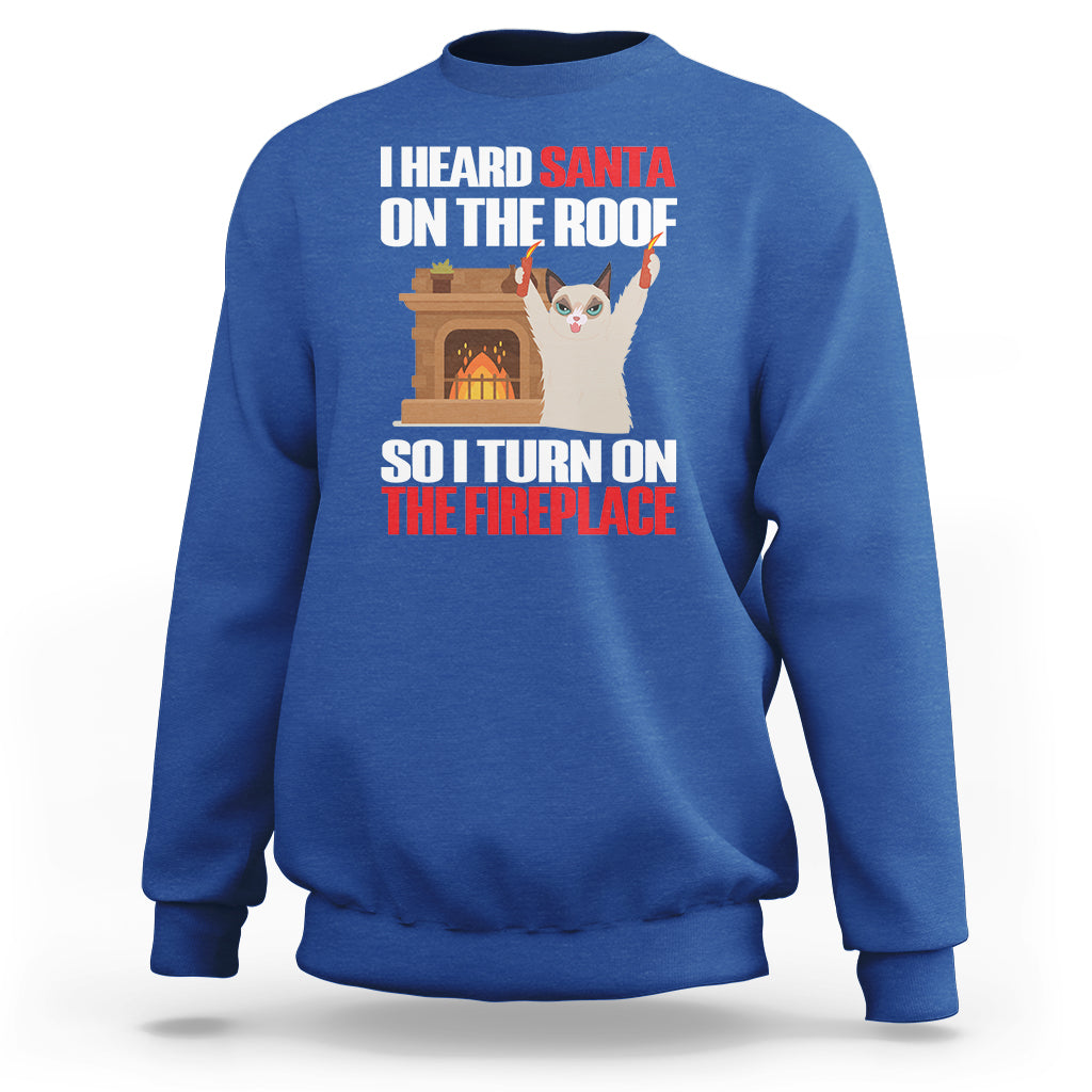 Cat Hates Santa Turned On The Fireplace Funny Christmas Sweatshirt - Wonder Print Shop