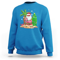 Christmas In Hawaii Sweatshirt Flamingo Float Xmas Palm Tree Surfboard Cute Santa At Beach - Wonder Print Shop