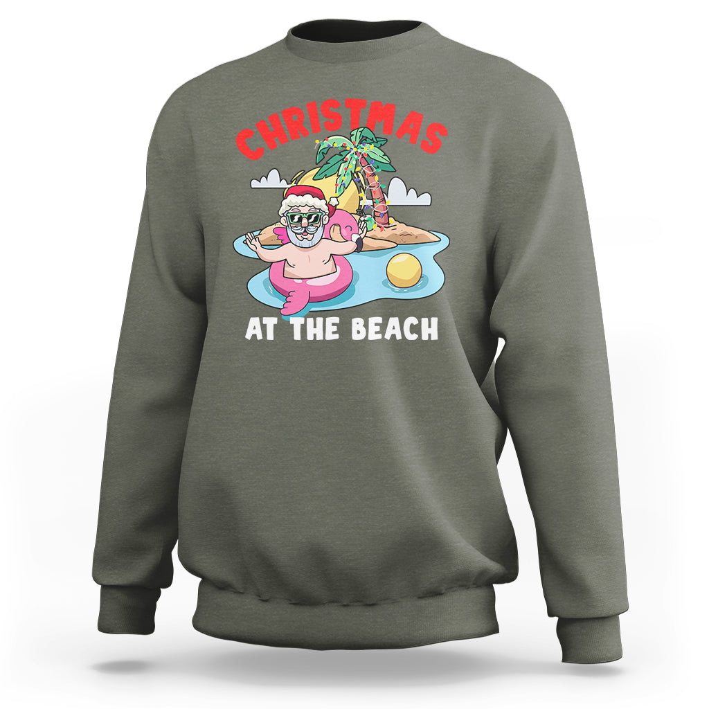 Funny Flamingo Float Santa Claus Christmas At The Beach Sweatshirt - Wonder Print Shop