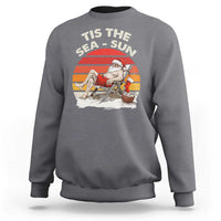 Funny Christmas In July Sweatshirt Tis The Sea Sun Santa At The Beach - Wonder Print Shop