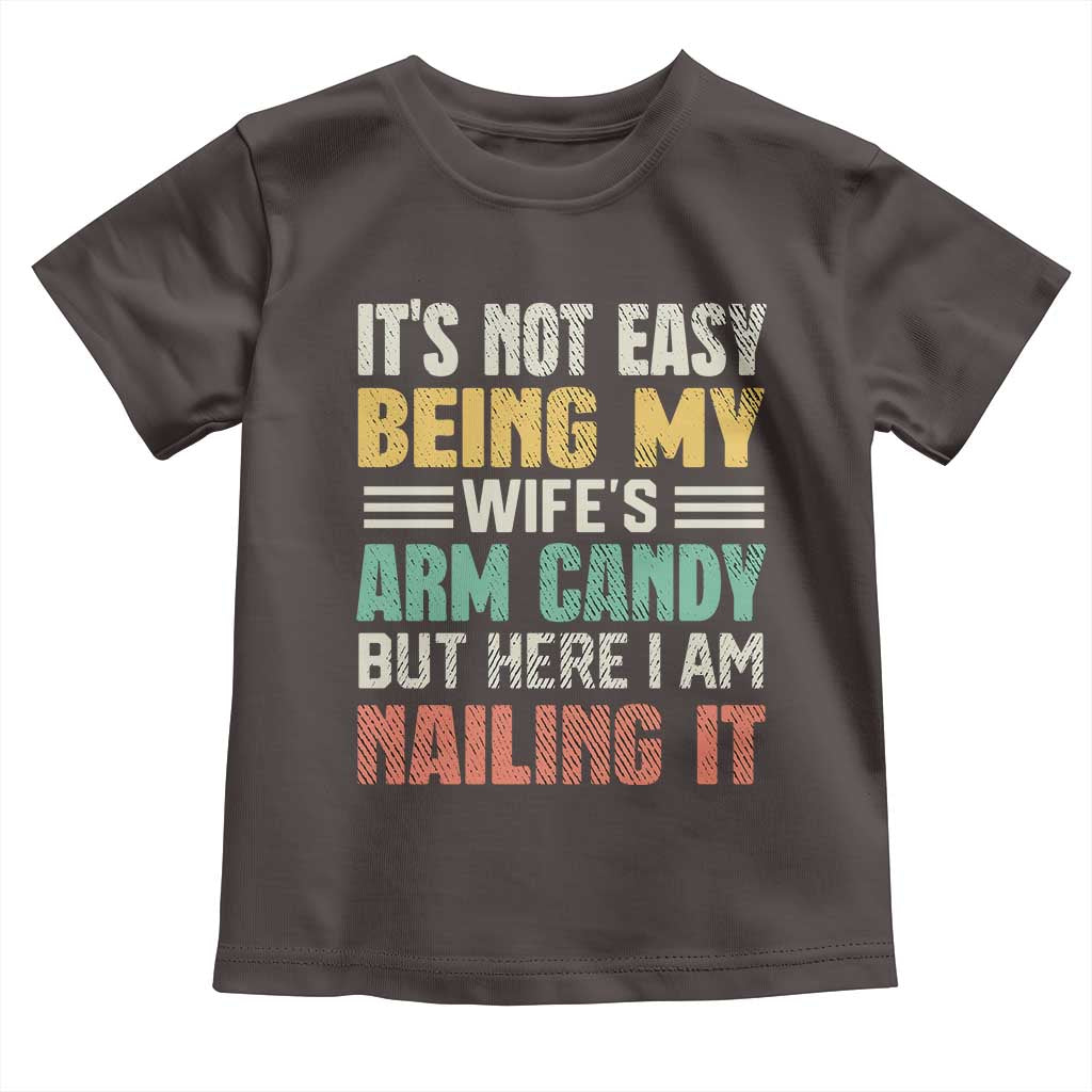 Funny Husband Toddler T Shirt It's Not Easy Being My Wife's Arm Candy