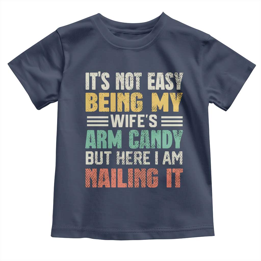 Funny Husband Toddler T Shirt It's Not Easy Being My Wife's Arm Candy