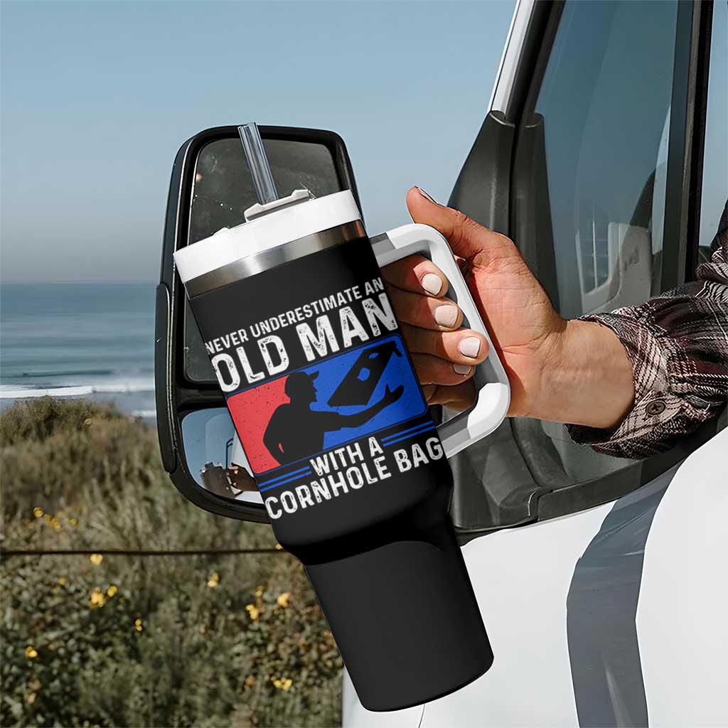 Funny Cornhole Player Tumbler With Handle Never Underestimate An Old Man With A Cornhole Bag
