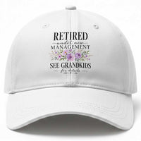 Retired Grandma Gift Baseball Cap Retired Under New Management See Grandkids For Details Retirement Flower Graphic