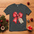 Christmas Pregnancy Announcement T Shirt Coquette Bow Xmas Maternity Gift - Wonder Print Shop