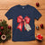 Christmas Pregnancy Announcement T Shirt Coquette Bow Xmas Maternity Gift - Wonder Print Shop
