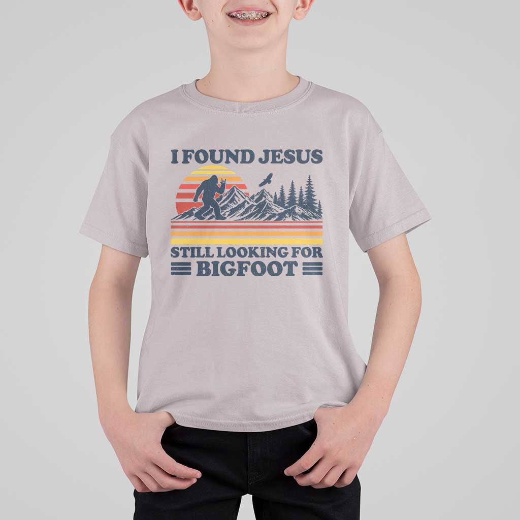 Retro I Found Jesus Still Looking Bigfoot T Shirt For Kid Funny Sasquatch Bigfoot Believer Christian Humor