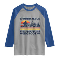 Retro I Found Jesus Still Looking Bigfoot Raglan Shirt Funny Sasquatch Bigfoot Believer Christian Humor