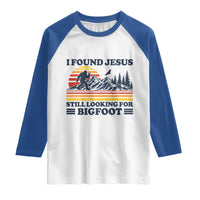 Retro I Found Jesus Still Looking Bigfoot Raglan Shirt Funny Sasquatch Bigfoot Believer Christian Humor