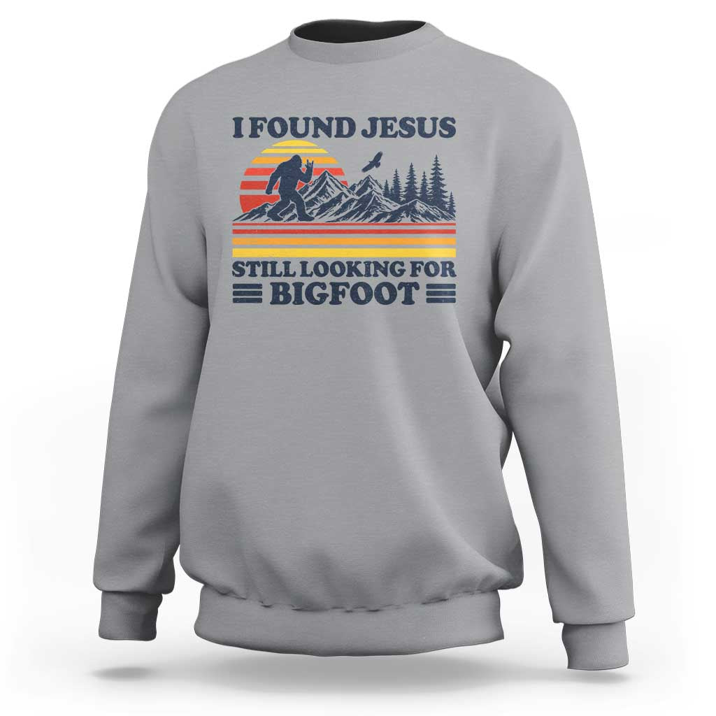 Retro I Found Jesus Still Looking Bigfoot Sweatshirt Funny Sasquatch Bigfoot Believer Christian Humor
