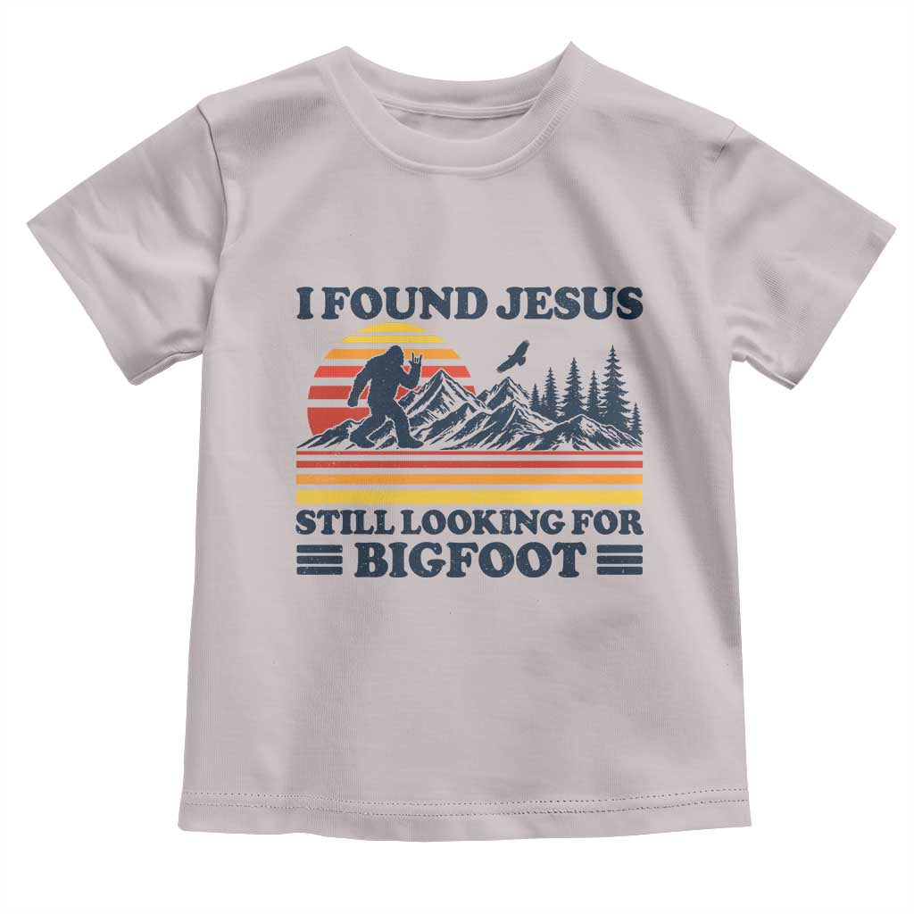 Retro I Found Jesus Still Looking Bigfoot Toddler T Shirt Funny Sasquatch Bigfoot Believer Christian Humor