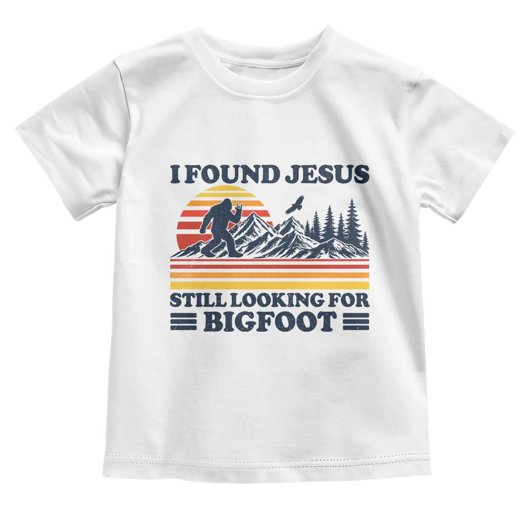 Retro I Found Jesus Still Looking Bigfoot Toddler T Shirt Funny Sasquatch Bigfoot Believer Christian Humor